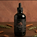 Melysa Hair Growth Oil bottle with castor, black seed, and pumpkin seed oil